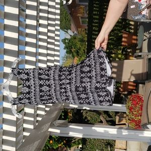 Black romper with geometric designs